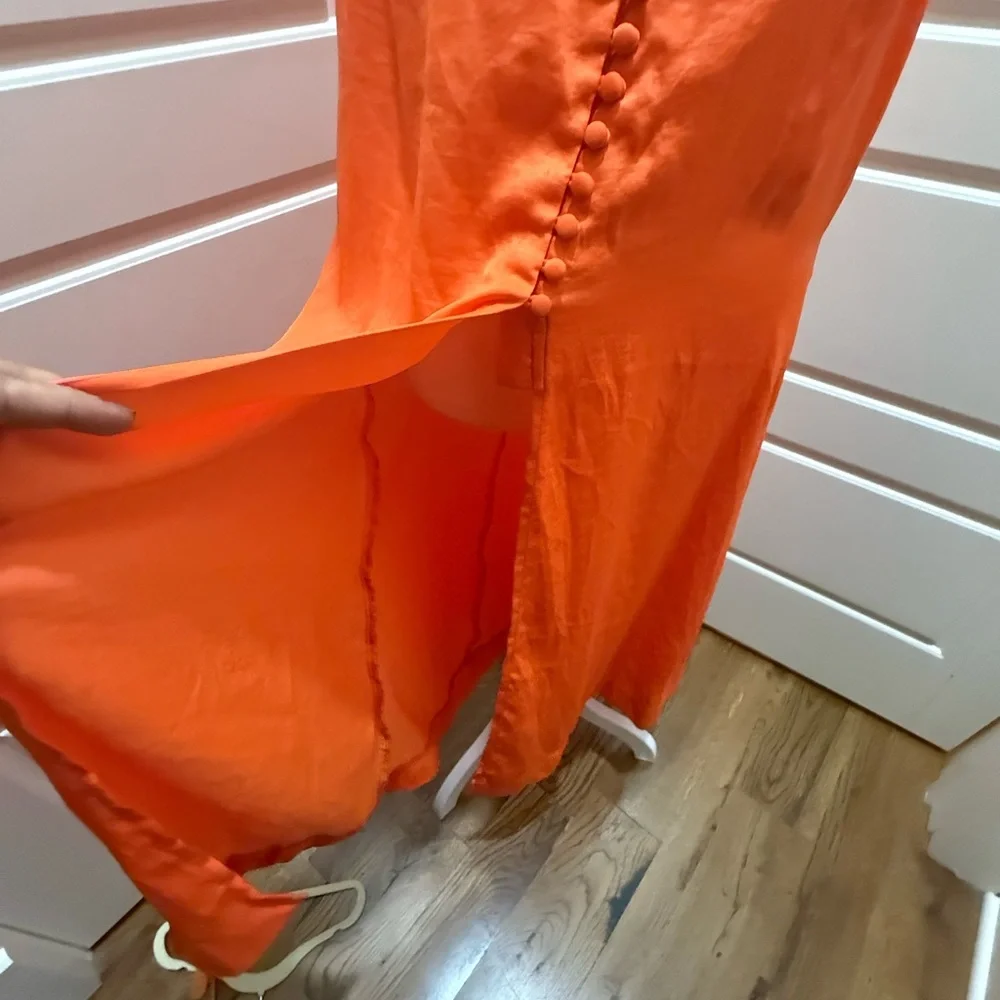 Free People. Orange Long Sleeveless Vneck Front & Back Blouse. Size 12.
